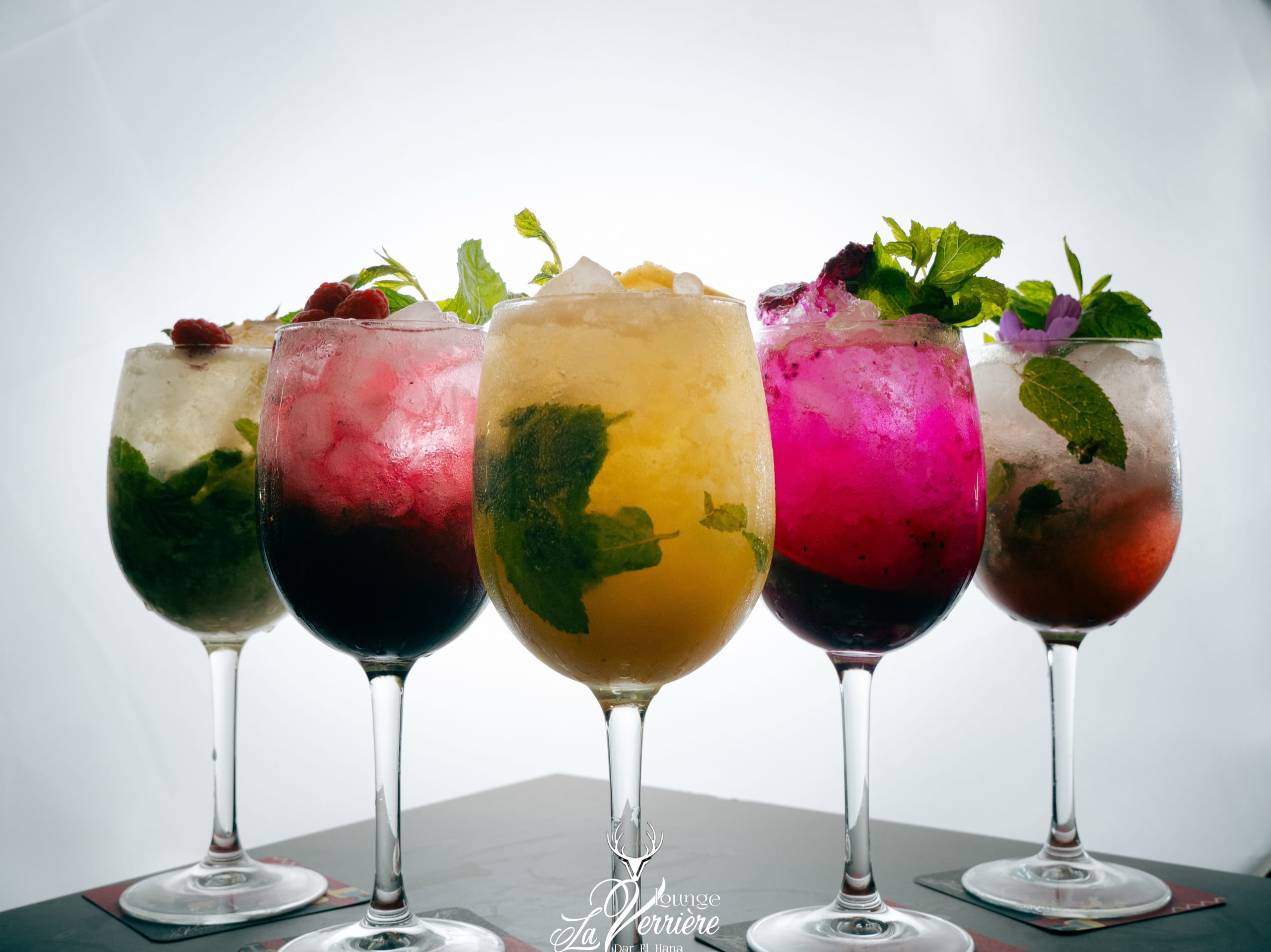 Five signature cocktails, backlit